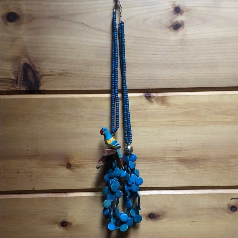 Large wooden beads exotic bird necklace